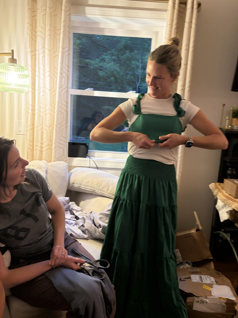 Trying on a mystery green dress mid-party
