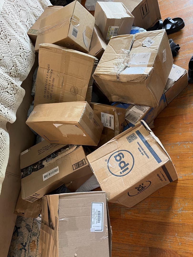 Stack of lost packages and returned items ready to open